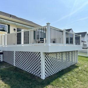 Raised deck with white and black railing 2