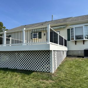 Raised deck with white and black railing 3